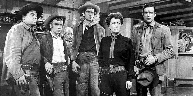 Left to right: Ernest Borgnine, Ben Cooper, Royal Dano, Joan Crawford and Scott Brady in 'Johnny Guitar' written and directed by Nicholas Ray.