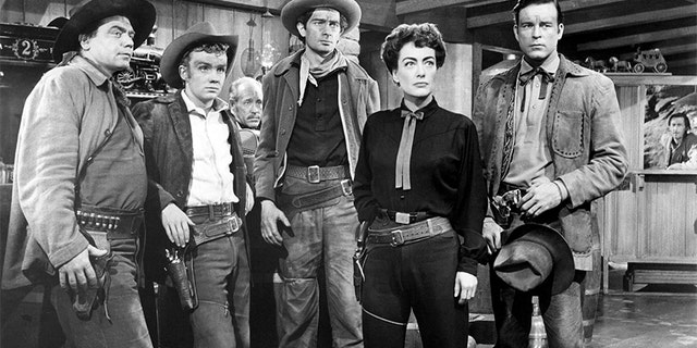 Left to right: Ernest Borgnine, Ben Cooper, Royal Dano, Joan Crawford and Scott Brady in 'Johnny Guitar' written and directed by Nicholas Ray.