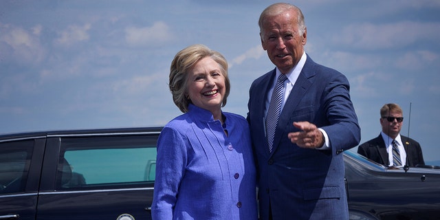 Democratic presidential nominee Hillary Clinton welcomes Vice President Joe Biden as he disembarks from Air Force Two for a joint campaign event in Scranton, Pennsylvania, August 15, 2016. REUTERS/Charles Mostoller - S1AETVPNGAAC