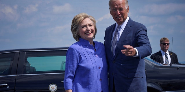 Democratic presidential nominee Hillary Clinton welcomes Vice President Joe Biden as he disembarks from Air Force Two for a joint campaign event in Scranton, Pennsylvania, August 15, 2016. REUTERS/Charles Mostoller - S1AETVPNGAAC