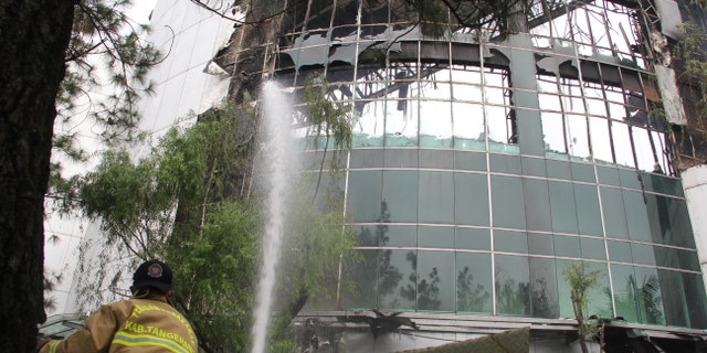 Firefighters were able to stop the church building from completely burning down Monday morning outside Jakarta.