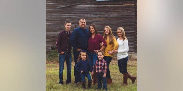 Shasta Hilyer (center), owner of Twin Berry Farms in McAlpin, Fla., pictured alongside her family (Shasta Hilyer, Twin Berry Farms).