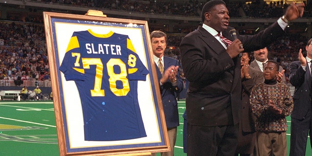 Former Los Angeles Rams tackle Jackie Slater speaking at a ceremony for retiring his jersey (#78) during halftime of a game against the Green Bay Packers on November 24, 1996. (Photo by Sporting News via Getty Images/Sporting News via Getty Images)