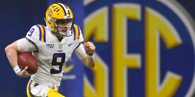 FILE - In this Dec. 7, 2019, file photo, LSU quarterback Joe Burrow (9) runs against Georgia during the second half of the Southeastern Conference championship NCAA college football game, in Atlanta. The Southeastern Conference broke the NFL record for first-round draft picks by a conference. Fifteen players from the powerhouse league were selected in the opening round Thursday night, April 23, 2020. (AP Photo/Mike Stewart, File)