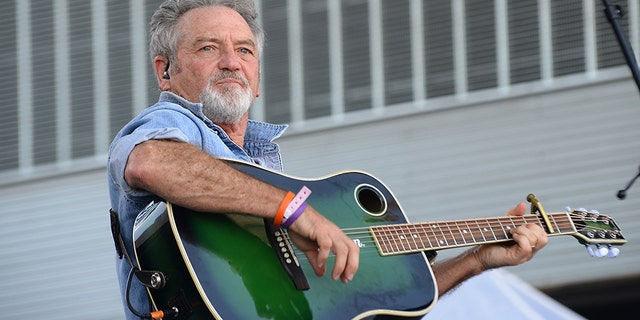 Larry Gatlin tested positive for COVID-19 this week but tells Fox News he's 'lucky' his symptoms are minor and feel 'like I have a cold.'