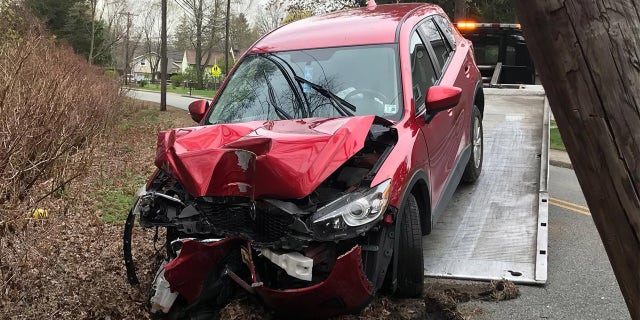 Police said the owner of this vehicle passed out and crashed after wearing an N95 mask behind the wheel for several hours.