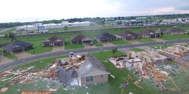 Drone video from the Monroe Fire Department showed several homes completely destroyed by a tornado, with roofs ripped complete off