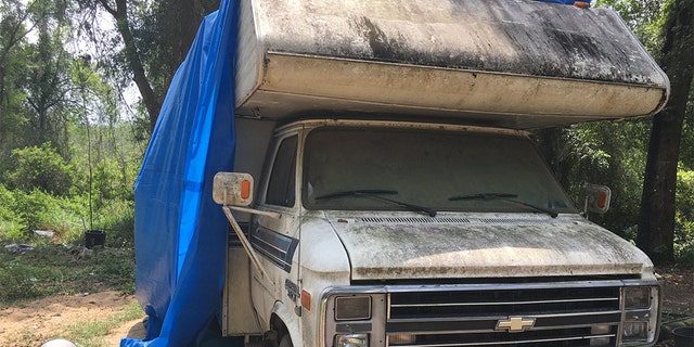 The victim was allegedly forced to imbibe an unknown substance and brought to a camper parked at the back of a Florida property, police said. (Courtesy: Marion County Sheriff’s Office)