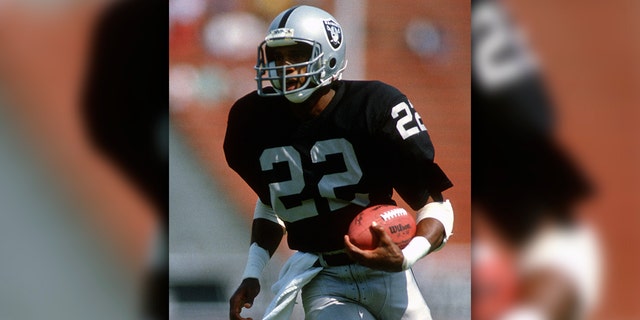 Mike Haynes of the Los Angeles Raiders runs with the ball against the San Diego Chargers during an NFL football game on Sept. 10, 1989 at the Los Angeles Memorial Coliseum in Los Angeles, California. Haynes played for the Raiders from 1983-89. (Photo by Focus on Sport/Getty Images)