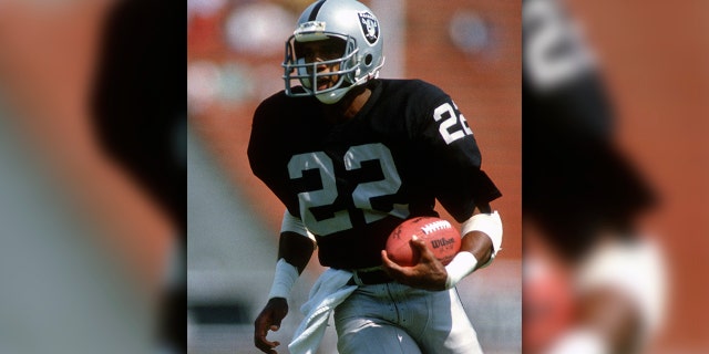 Mike Haynes of the Los Angeles Raiders runs with the ball against the San Diego Chargers during an NFL football game on Sept. 10, 1989 at the Los Angeles Memorial Coliseum in Los Angeles, California. Haynes played for the Raiders from 1983-89. (Photo by Focus on Sport/Getty Images)