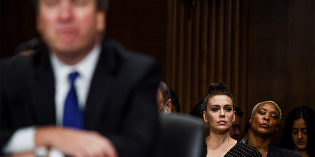 Actress Alyssa Milano watches a Senate Judiciary Committee hearing on Capitol Hill in Washington, DC, U.S., September 27, 2018. Matt McClain/Pool via REUTERS - RC13A7C2F350