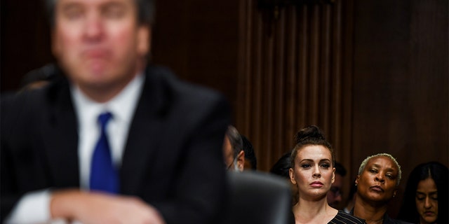 Actress Alyssa Milano watches a Senate Judiciary Committee hearing on Capitol Hill in Washington, DC, U.S., September 27, 2018. Matt McClain/Pool via REUTERS - RC13A7C2F350