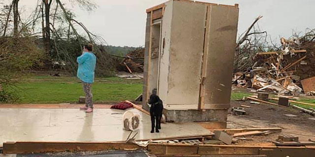 While the rest of their home was obliterated in a matter of seconds Sunday afternoon, Amber Phillip, her husband, Andrew, and their kids, ages 2 and 6 months, survived the storm without a scratch inside the small safe room, which doubles as a closet.