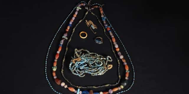 Necklaces were discovered with the mummy. (Egyptian Ministry of Tourism and Antiquities)