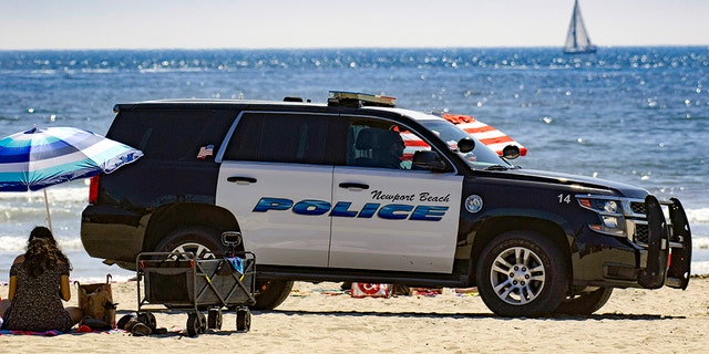 NEWPORT BEACH, CA - APRIL 25: Newport Beach Police patrol near the pier as thousands enjoy a day at the beach on Saturday, April 25, 2020. (Photo by Mindy Schauer/MediaNews Group/Orange County Register via Getty Images)