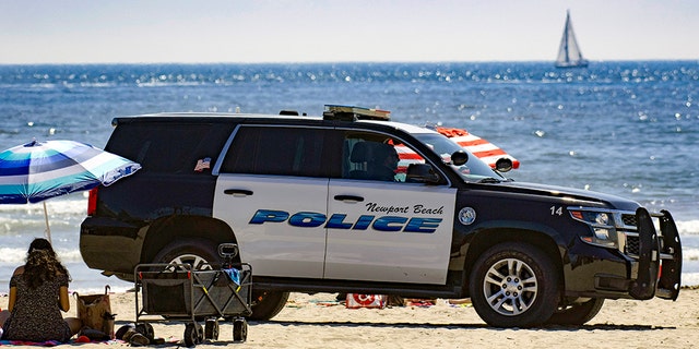 NEWPORT BEACH, CA - APRIL 25: Newport Beach Police patrol near the pier as thousands enjoy a day at the beach on Saturday, April 25, 2020. (Photo by Mindy Schauer/MediaNews Group/Orange County Register via Getty Images)