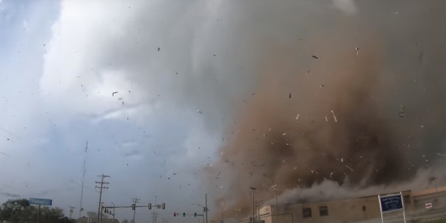 A tornado bears down on Madill, Okla., damaging structures on April 22, 2020.