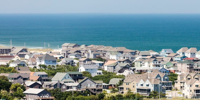 Wall to wall beach house packed into the town of Buxton near Cape Hatteras in the Outer Banks of North Carolina