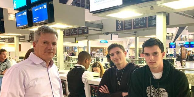 David Berman and his sons Jacob and Josh at the airport in Cape Town, South Africa. They had been on standby to leave on the last flight to New York before the country's coronavirus lockdown began.