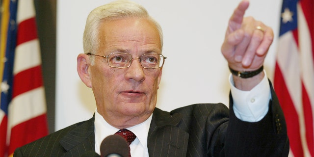 Then U.S. Secretary of Treasury Paul O'Neill points to a reporter during a post G-7 news conference at the World Bank Building in Washington, U.S., September 28, 2002.
