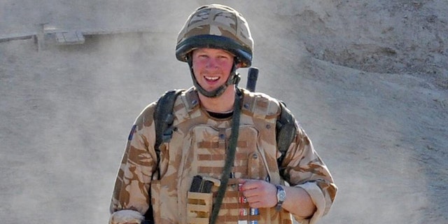 Prince Harry patrols the deserted town of Garmisir on January 2, 2008, in Helmand province, Afghanistan.