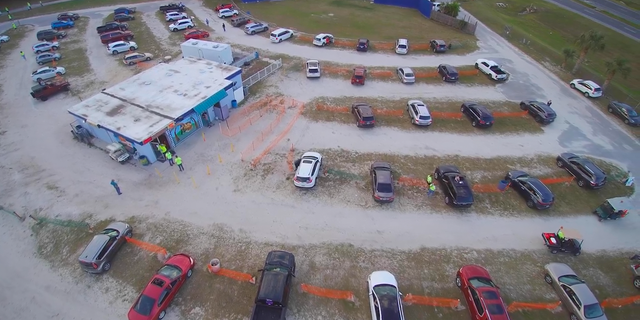 Watzke fenced off every other parking space to abide by social distancing guidelines and keep his customers safe. (Jake Borneman)