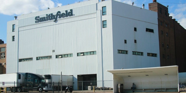 “We believe it is our obligation to help feed the country, now more than ever," the CEO of Smithfield Foods said Sunday. "We have a stark choice as a nation: we are either going to produce food or not, even in the face of COVID-19.”