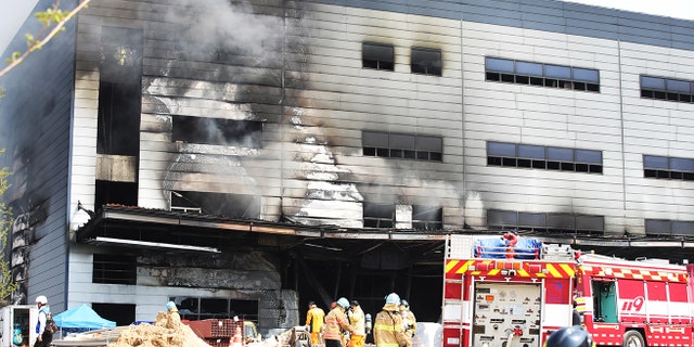 Smoke rises from a warehouse which is currently under construction, after it caught fire, in Icheon, South Korea, April 29, 2020.
