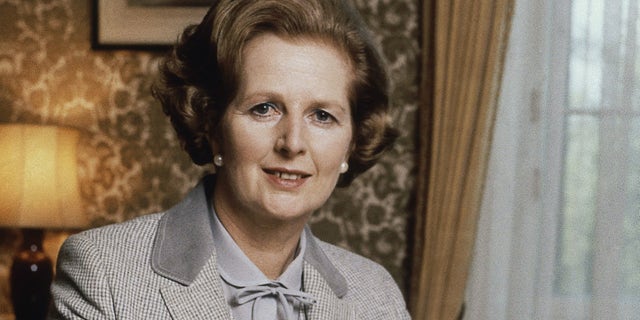FILE - In this 1980 file photo, British Prime Minister Margaret Thatcher poses for a photograph in London. (AP Photo/Gerald Penny, File)