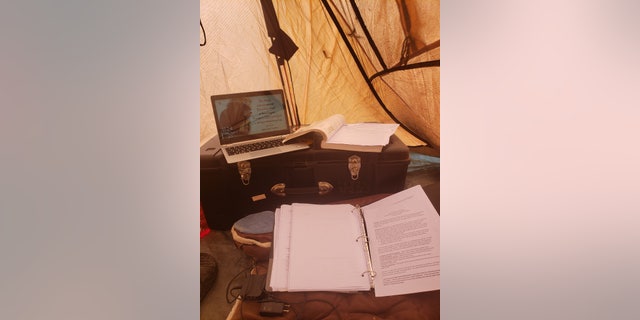 Inside Cadet William Taylor's tent where he is completing his college semester after the coronavirus pandemic.