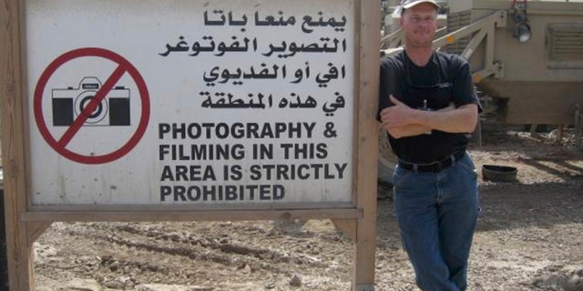 Mark Frerichs, a contractor from Illinois, poses in Iraq in this undated photo obtained from Twitter that he would include with his resume when job hunting. Frerichs was abducted in Afghanistan in January 2020. Early efforts to locate him have been shrouded in mystery and his disappearance has been the subject of minimal public discussion by the U.S. government. The Associated Press has learned that in the days following Frerichs’ capture, Navy commandos raided a village and detained suspected members of the Taliban-linked Haqqani network while the U.S. intelligence community tried to track the cellphones of Frerich and his captors. (Twitter via AP)