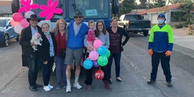 With a little help from a friend, the fleet of waste management trucks cruised by the family’s home in Henderson, Nev. to wish Lena a very happy birthday.