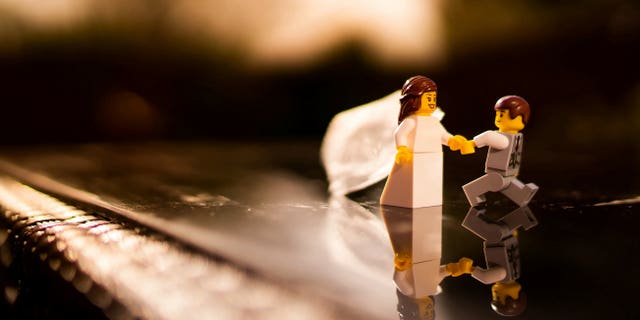 He collected together his figurines and recreated popular staged photos from most weddings.