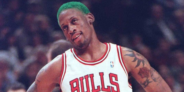 Chicago Bulls forward Dennis Rodman looks at a referee after being called for an illegal defense during the first quarter at the United Center in Chicago.