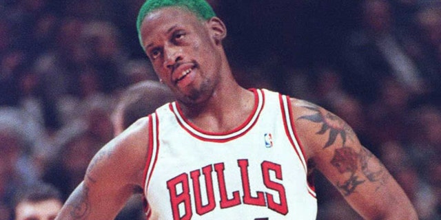 Chicago Bulls forward Dennis Rodman looks at a referee after being called for an illegal defense against the New York Knicks during the first quarter at the United Center in Chicago.