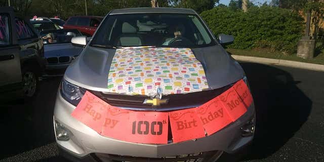 Charlene Anderson admitted “the lighting wasn’t so good,” making it hard to see some of the people in their cars, but she was still able to “recognize the voices” from those wishing her a happy birthday as they drove by.