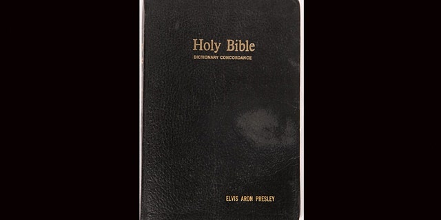 This Bible gifted to Elvis Presley in 1977 has his name engraved on the front cover.