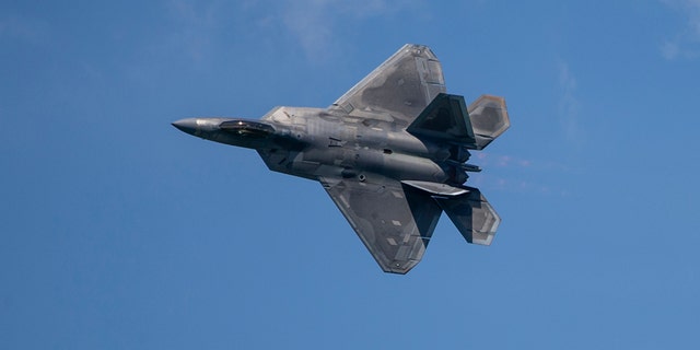 A U.S. Airforce F-22 Raptor with the 154th Wing, Hawaii Air National Guard, conducts an aerial demonstration during the Singapore Airshow 2020 near Changi Exhibition Center, Republic of Singapore, Feb. 15, 2020. (U.S. Marine Corps photo by Staff Sgt. Vitaliy Rusavskiy)