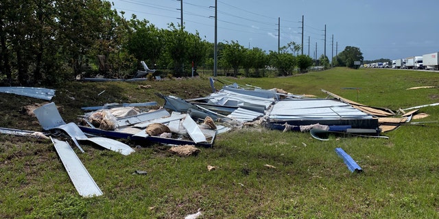A portable building was smashed on the side of Interstate 75 near Ocala, Fla., on Monday after it was tossed by a tornado.