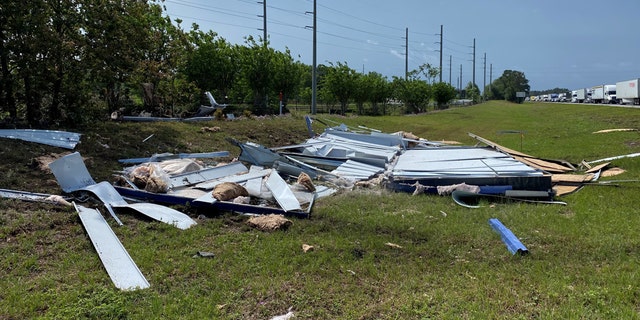 A portable building was smashed on the side of Interstate 75 near Ocala, Fla., on Monday after it was tossed by a tornado.