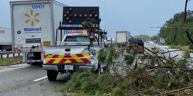 Debris on Interstate 75 after a tornado crossed the major highway on Monday near Ocala, Fla.