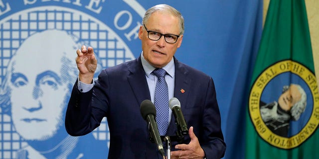 FILE - In this Monday, April 13, 2020, file photo, Washington Gov. Jay Inslee speaks during a news conference at the Capitol in Olympia, Wash. (AP Photo/Ted S. Warren, File)