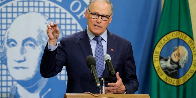 FILE - In this Monday, April 13, 2020, file photo, Washington Gov. Jay Inslee speaks during a news conference at the Capitol in Olympia, Wash. (AP Photo/Ted S. Warren, File)