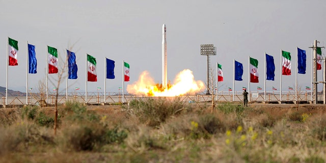 In this photo released Wednesday, April 22, 2020, by Sepahnews, an Iranian rocket carrying a satellite is launched from an undisclosed site believed to be in Iran's Semnan province.