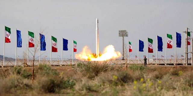 In this photo released Wednesday, April 22, 2020, by Sepahnews, an Iranian rocket carrying a satellite is launched from an undisclosed site believed to be in Iran's Semnan province.