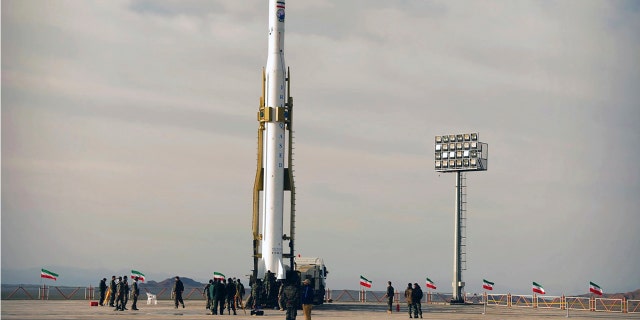 Iran's Revolutionary Guard said Wednesday it put the Islamic Republic's first military satellite into orbit, dramatically unveiling what experts described as a secret space program with a surprise launch that came amid wider tensions with the United States.