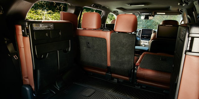 The standard Land Cruiser comes with a third row of seats that fold down and flip to the side.