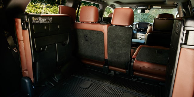 The standard Land Cruiser comes with a third row of seats that fold down and flip to the side.