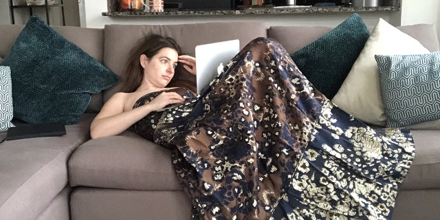 One New York woman is workin’ it while she works from home during the coronavirus pandemic, tackling each day of remote employment in a different glamorous gown.
