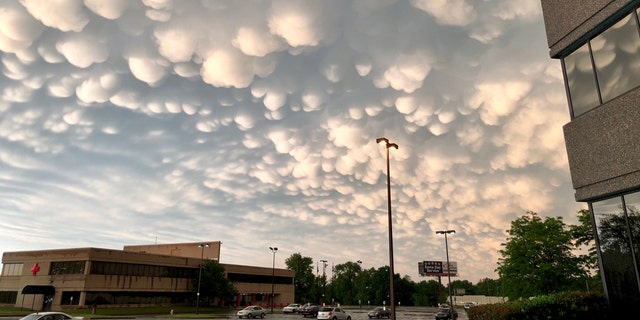 Mammatus clouds can be seen in the skies over Tulsa, Okla. after severe thunderstorms on Tuesday.